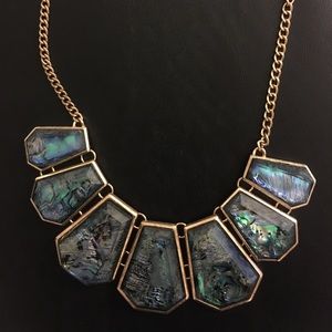 Blue multi-colored statement piece with gold trim